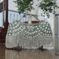 Grüne Kristall Abendtasche Clutch mit Metallgriff und glitzernden Strass Fransen. - Grün
