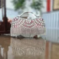 Elegante Strass-Abendtasche mit glitzernden Kristallfransen und Metallgriff für Damen. - Rot