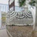 Silver rhinestone evening clutch bag with sparkling crystals and elegant tassel fringe design. - Black