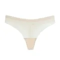 Detail view of seamless nude thong underwear, breathable mesh fabric, smooth comfortable fit. - S / Bottoms / White