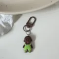 Cute funny cartoon doll metal keychain bag charm pendant creative accessory stylish gift - Green Clothes