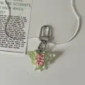 Transparent green butterfly keychain with sweet pink ribbon design, cute backpack accessory. - Light Green