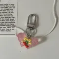 Transparante roze vlinder sleutelhanger met strik en kers hanger voor rugzak accessoire. - Oranjeroze