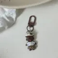 Funny doll keychain cute character pendant brown metal clasp creative fashion bag accessory - Brown Short Skirt