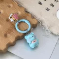 Blue cartoon bear keychain with cherry blossom bell and cute bib pendant for bags and keys. - Blue