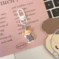 Cute cartoon animal overall keychain detail shot, retro style backpack pendant accessory. - Grey Polka Dot Dog