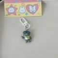 Cute cartoon seal keychain with diving goggles and backing card, perfect student gift accessory. - Seal