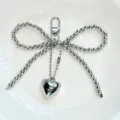 Silver metal beaded bow keychain and bag charm featuring a cute heart pendant aesthetic accessory - CCB Heart Bow (Gate Clasp)