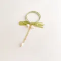 Elegante elastico per capelli stile Mori verde con fiocco mughetto, nappe ed elastico. - Elastico Corto / Verde