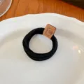 Elastico per capelli nero con toppa in pelle d'orso, legaccio per coda di cavallo 5cm - Nero