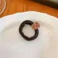 Elastico per capelli marrone con toppa in pelle d'orso da donna, supporto per coda di cavallo. - Marrone Chiaro