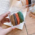 Lacci per capelli intrecciati colorati macaron elastici corde capelli in scatola trasparente SKU - Elastico per Capelli Costine Colore Misto Scuro