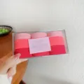 Colorful elastic hair ties set in a clear box, gradient pink hair bands for daily styling. - Pink Series