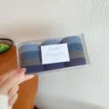 Blue and grey hair ties set in clear storage box, elastic hair bands for daily styling. - Grey Series