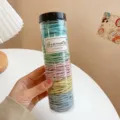 Colorful elastic hair ties in a clear storage jar, stretchable hair scrunchies for ponytails. - Sky Blue Mixed Ribbed 200 Pcs