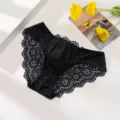 Black floral lace briefs detailed view, showing breathable hollow design and soft trim. - S / Bottoms / Black
