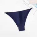 Close-up detail of women seamless ice silk thong panties with adjustable metal side buckle. - M / Dark Blue