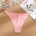 Pink seamless low-waist ice silk women's thong panties featuring delicate metal adjusters. - Pink