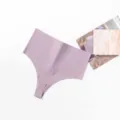 Detailed view of the seamless high-waist solid purple thong, soft fabric and invisible fit. - Light Purple