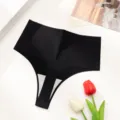 Black seamless thong underwear for women, minimalist solid color sexy low waist style. - XS / Bottoms / Black