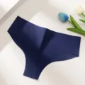 Detailed close-up of a seamless navy blue women's low-waist thong with breathable fabric. - XS / Bottoms / Dark Blue