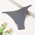 Culotte string sans coutures en soie glacée pour femmes avec brides latérales et lanières. - Gris