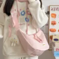 Lässige rosa Canvas Umhängetasche für Damen, große Kapazität, Dumpling Schultertasche. - Mit Anhänger / Rosa