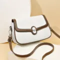 Damen Leder Umhängetasche mit schickem braunem Besatz, elegante weiße Schultertasche für den Alltag. - Weiß
