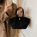Elegante schwarze Wildleder Damentasche Retro Schultertasche Shopper mit Metallverschluss. - Schwarz