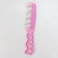 Peigne en acier rose pour le coiffage des perruques et soins capillaires avec manche ergonomique. - Peigne en acier