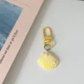 Yellow seashell keychain with pearl detail, cute bag pendant and chic accessory gift. - Yellow