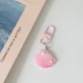 Pink gradient shell keychain with pearl and star charm, cute bag pendant and chic accessory. - Light Pink