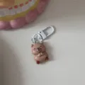 Cute cartoon brown bear keychain with white clasp for bags and keys. - Capybara