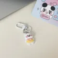Simpatico portachiavi con cagnolino cartone animato bianco ciondolo borsa carino e regalo - Cucciolo con vestiti gialli