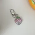 Transparent glitter gradient strawberry keychain, cute bag pendant and charming accessory for girls. - Pink