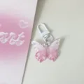 Translucent butterfly keychain with floral jelly charm, clear bag pendant for cute daily style. - Deep Pink