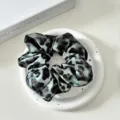 Green leopard print satin scrunchie detail view, soft hair tie for women daily use - Leopard Style 6