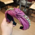 Purple leather headband with gold chunky chain, stylish knotted hair accessory for women. - Purple