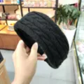 Black cable knit headband for women, wide winter hair hoop, cozy fashion hair accessory. - Black