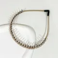 Elegant beaded headband with anti-slip teeth, sparkling rhinestones for stylish daily hair styling. - Crystal Style Champagne