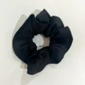 Solid black satin scrunchie for women, elegant hair tie and versatile ponytail accessory. - Solid Black Lace Scrunchie