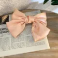 Pink satin bow hair clip, large sweet JK style hair accessory for cute girls and fashion. - Champagne Spring Clip
