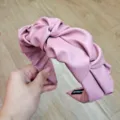 Pink PU leather headband for women, stylish pleated hair hoop with elegant knot design. - Pink PU Leather Bud Style