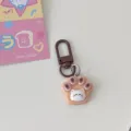 Cute cat paw keychain, resin cute claw pendant with brown hook for bags and keys. - Brown