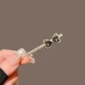 Pinza de pelo de diamantes de imitación dorados con lazo de corazón negro, elegante horquilla. - Lazo de Cristal Corazón / Dorado