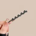 Εξαιρετικό σκούρο τσιμπιδάκι μαλλιών με στρας, αστραφτερό κλιπ για κομψή φλάντζα. - Φύλλο Γκίνγκο με Στρας