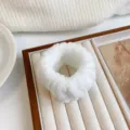 White plush absorbent wristbands for washing face, soft fluffy sweatbands for sports and use. - White