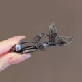 Black alloy rhinestone hair clip, elegant leaf design with pearl accent for side styling. - Sparkling Rhinestone Double Tail Gunmetal #23