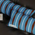 Detailed view of blue and brown striped throw pillow with fabric texture, modern vintage style. - 50x30 / Cushion Cover Only / Blue Brown White Stripe