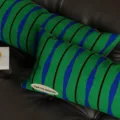 Green and blue striped pillow detail showcasing soft fabric texture and stylish retro design. - 50x30 / Cushion Cover Only / Green Blue Black Stripe